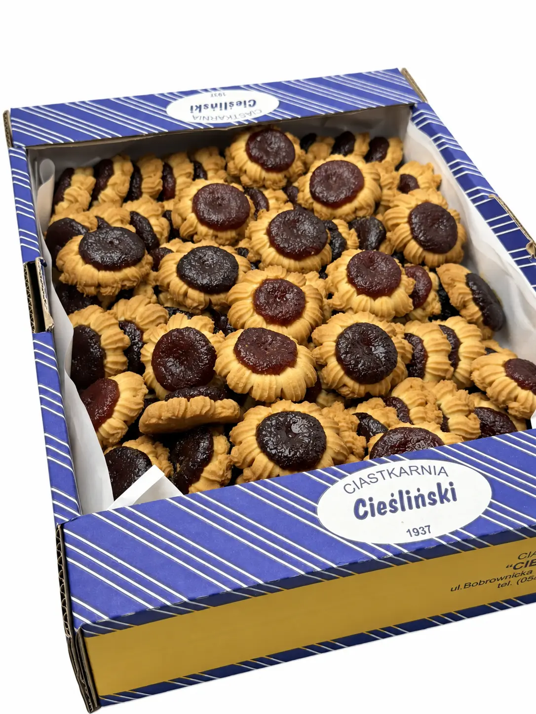 Otwarte pudełko ciastek Cieśliński z owocową marmoladą